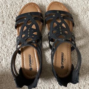 7 1/2 black with gold features sandals Makalu